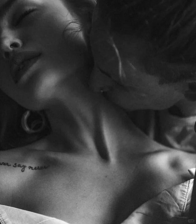 A pair of deeply in love lovers are making love, utterly lost in passion