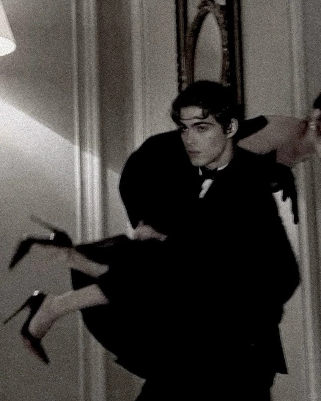 What If My Brother Is Too Perfect-﻿Ethan in a black suit and bow tie holds Amelia in his arms.