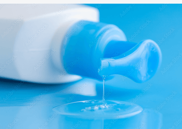 How to Choose the Best Lubricant bottle dispensing liquid on a blue background for optimal safety and compatibility.