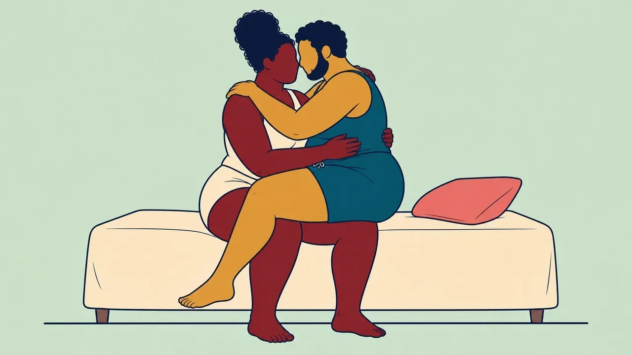 Two plus-size adult partners embrace closely at the edge of a bed.