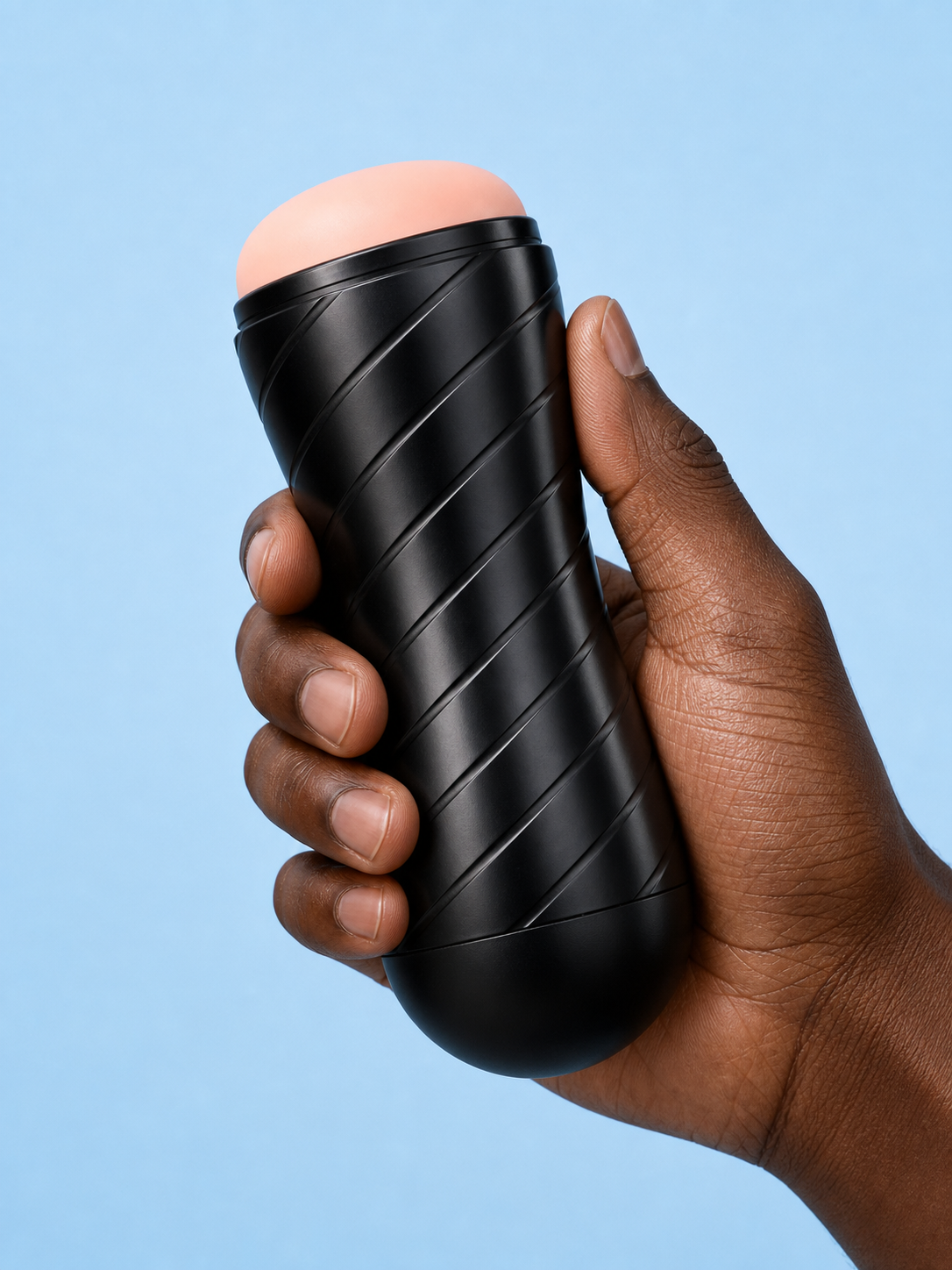 Two men sharing an intimate moment with a prostate massager, promoting the collection For Men.