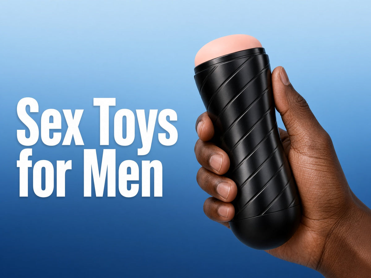 Two men sharing an intimate moment with a prostate massager, promoting the collection For Men.