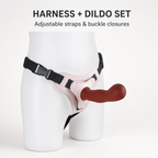 Harness and dildo set with adjustable black straps and side buckles