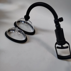 Black two-cup vulva pump set assembled with hose and pump