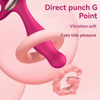 Close-up of a vibrant pink vibrating silicone anal plug designed for direct G-point stimulation.