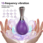 Purple 12-frequency personal massager with metallic accent displayed on open hands, floral effect background