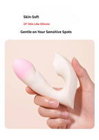 App Controlled Thrusting Wearable Vibrator held in hand, featuring a soft skin-like silicone design with a pink tip.