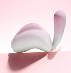 Pink Bunny 180 Rotating Tail Sucking Vibrator showcasing its unique design and features against a soft pink background.