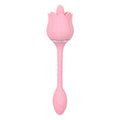 Pink silicone rose-shaped adult wellness massager with long textured handle