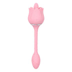 Pink silicone rose-shaped adult wellness massager with long textured handle