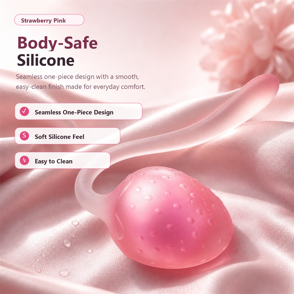 Pink strawberry kegel balls shown with soft satin-style product styling