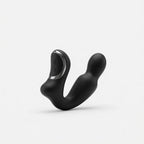 Black rotating vibrating prostate massager on a clean white background