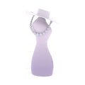 Stylish female torso vibrator with built-in lubrication and a chic hat and bead necklace for an elegant display.