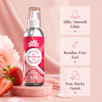 Wet Stuff Strawberry Edible Water Based Lube bottle with silky-smooth glide and strawberry flavor on a pink background.