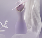 Stylish female torso vibrator with built-in lubrication, featuring a soft silicone design and elegant accessories.