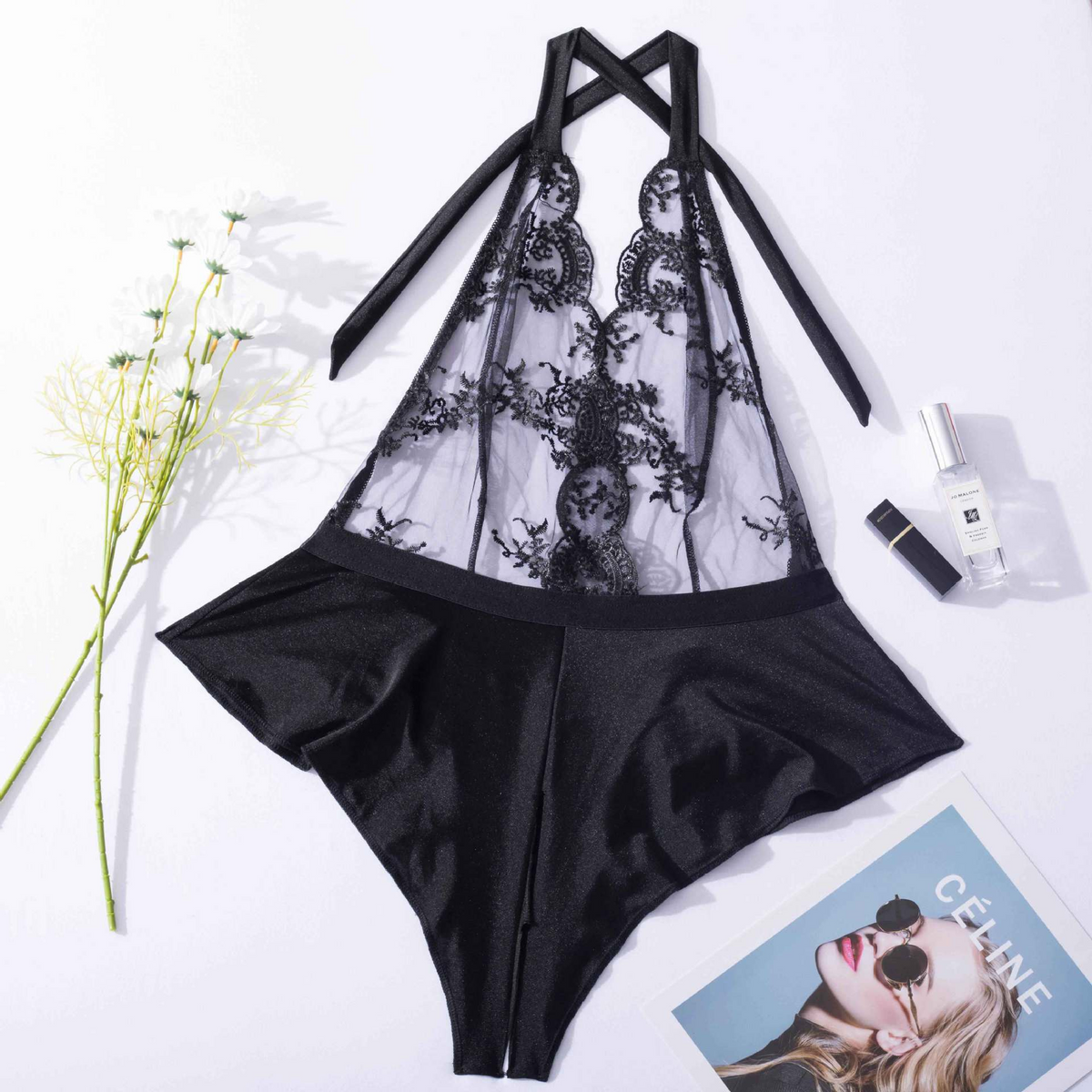 Black sheer embroidered halter romper lingerie flat lay