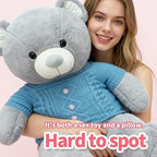 A woman holding a Plush Teddy Bear Pillow Thrusting Dildo, showcasing its soft design and dual function as a toy and pillow.