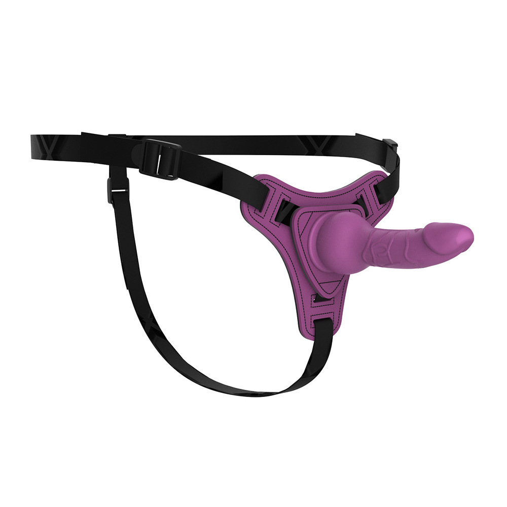 Purple adjustable strap-on harness with textured front-mounted extension, product overview