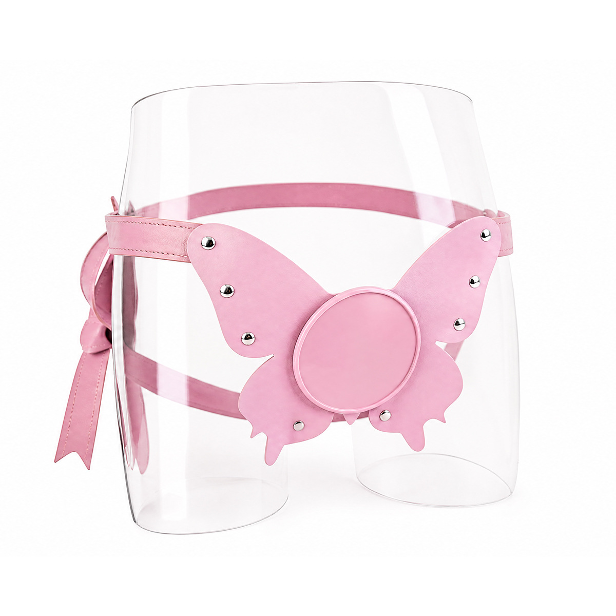 Pink butterfly adjustable strap-on harness on display form, showing front panel and circular mount
