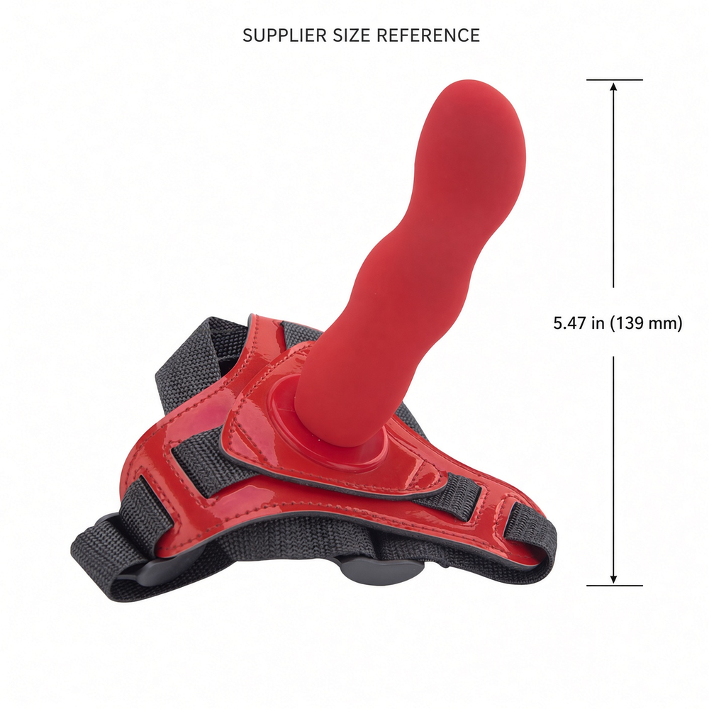 Supplier size reference image for the red strap-on harness attachment showing 5.47 inches (139 mm)