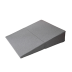 Gray folding sex positioning wedge pillow shown in its fully opened incline configuration