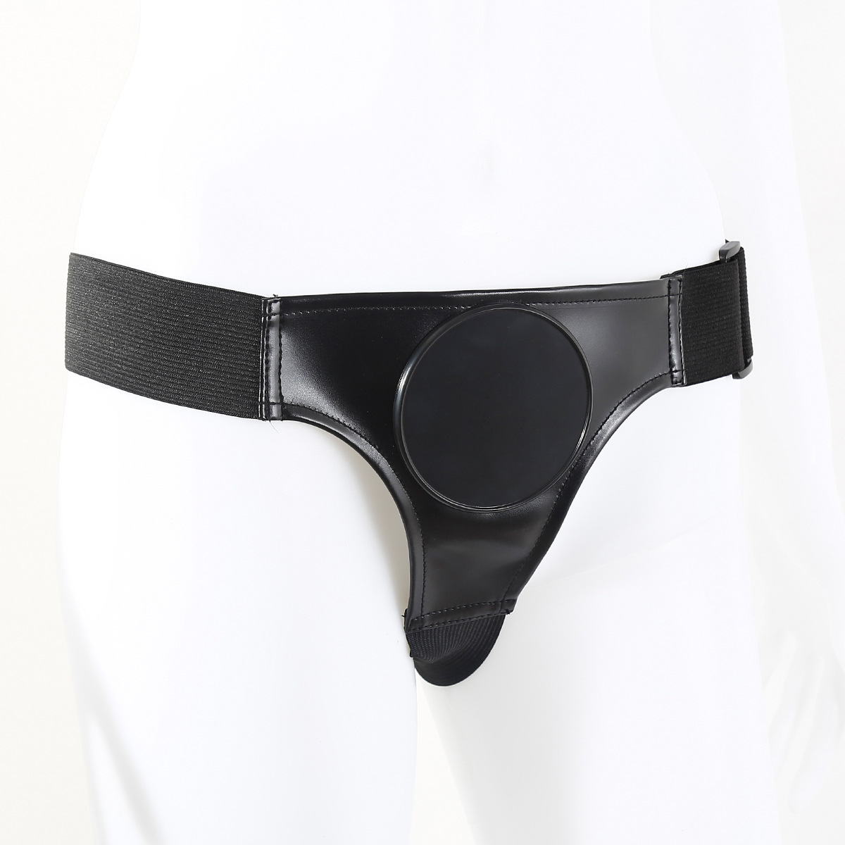 Black round-disc strap-on harness shown on white display mannequin