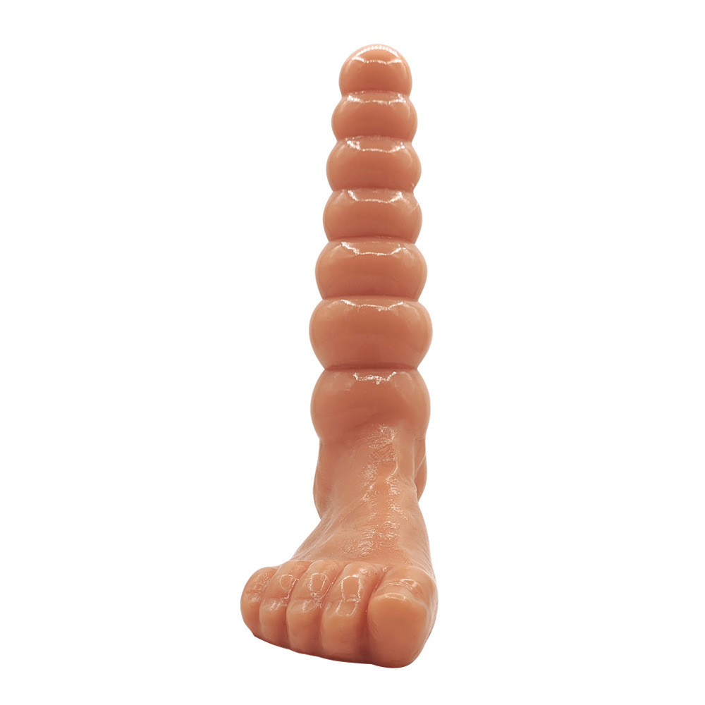 Front view of flesh-tone beaded fantasy foot showing sculpted toe and raised bead details