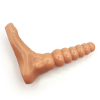 Flesh-tone beaded fantasy foot toy photographed horizontally on white