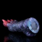Real product photograph showing the back and underside contour of silicone fantasy claw masturbator