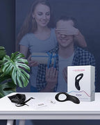 App Vibrating Penis Ring and prostate massager by Lovense on a table, with a couple in the background.