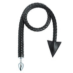 Black braided PU triangle riding whip and metal anal plug on white background