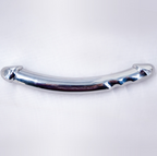 Full view of the curved metal wand showing the contoured end and shallow grip grooves