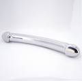 Curved double-ended silver metal massage wand with rounded and contoured ends on a white background