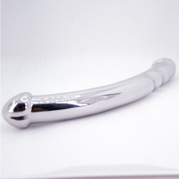 Reverse angled view of the silver curved double-ended metal wand showing its polished surface and rounded end