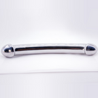 Full side profile of the curved silver metal massage wand showing its two rounded ends