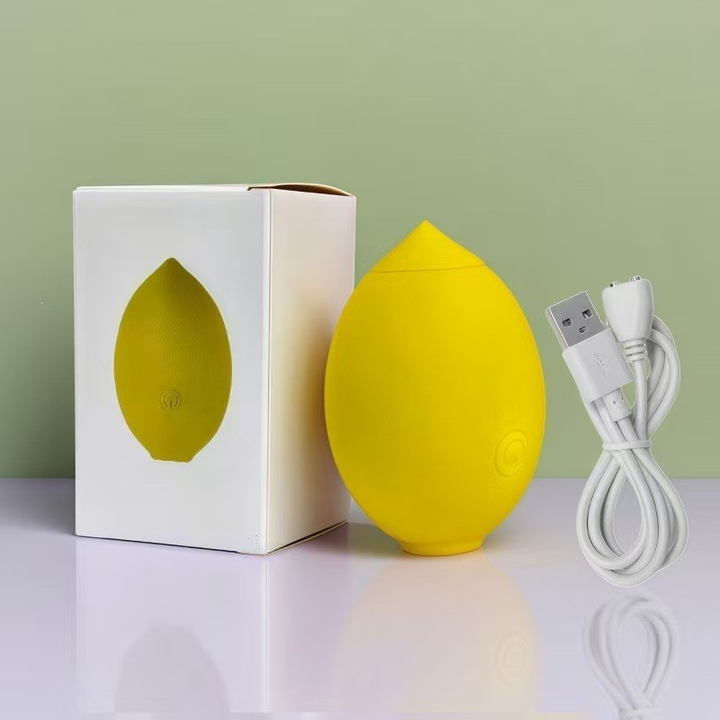 Yellow lemon-shaped suction vibrator with packaging and USB charging cable