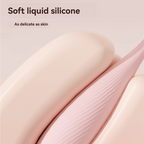 Close-up of the soft pink liquid silicone surface of the mini vibrator.