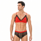 Male model wearing black and red lace bralette and matching lace brief