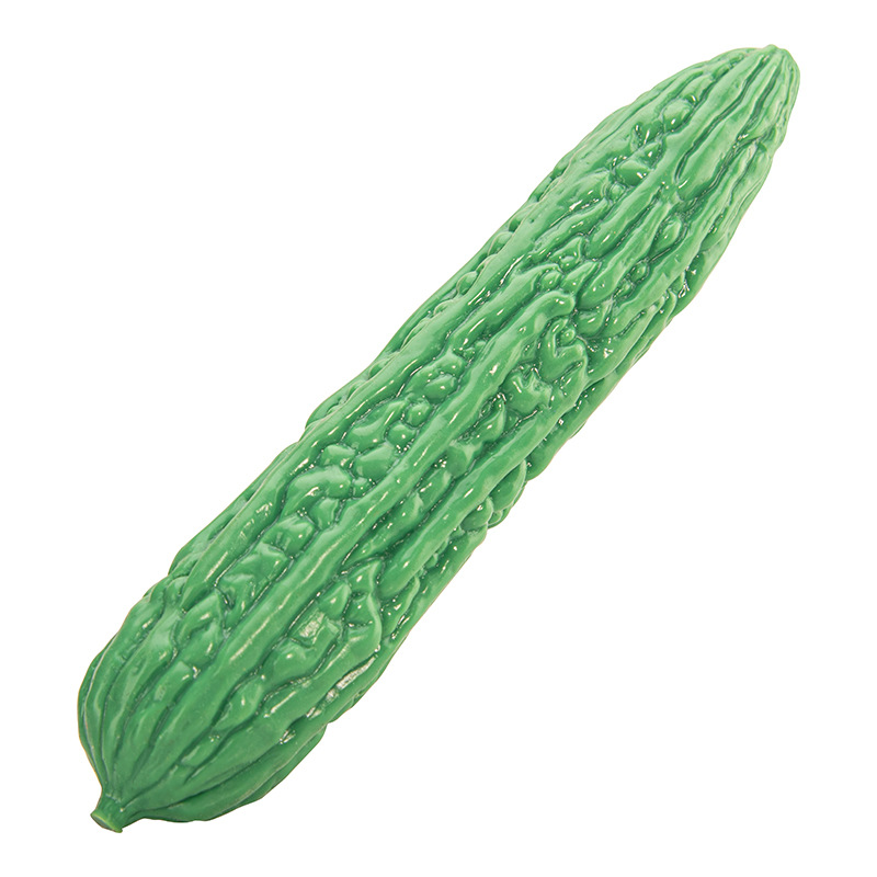 Green bitter melon texture silicone dildo on a clean white background
