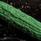 Water droplets highlighting the raised bitter melon texture