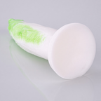 Cabbage-texture silicone dildo shown from a low angle with the wide suction cup base visible