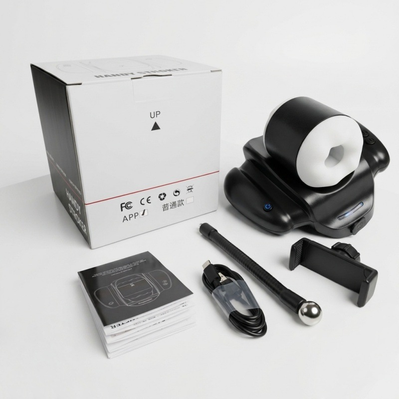 Package contents for the automatic stroker, including the flexible phone holder, USB charging cable and instruction manual
