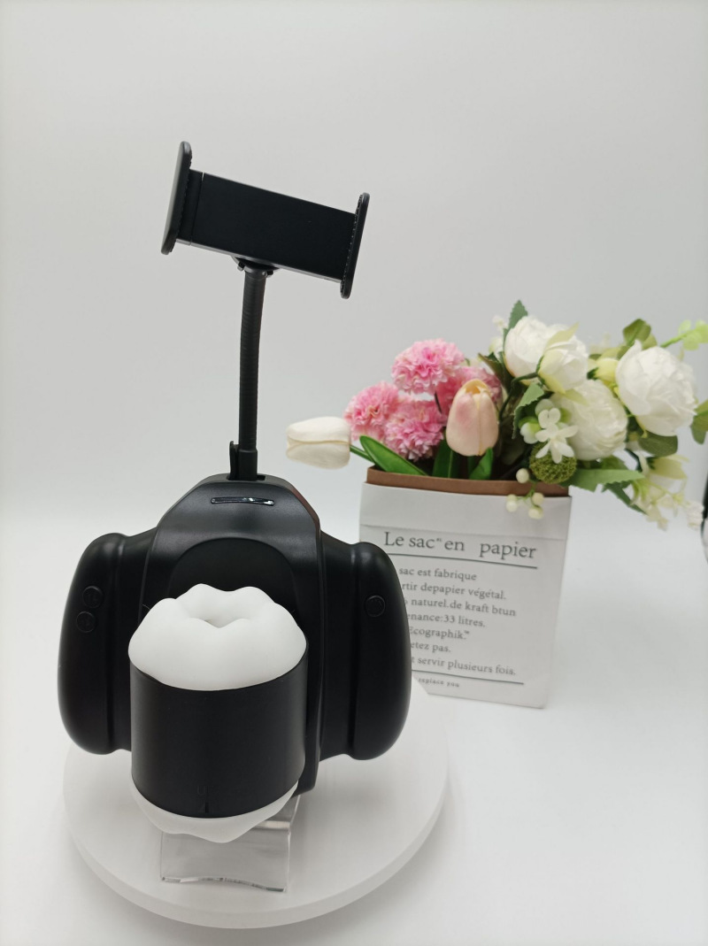 Automatic stroker displayed with its flexible phone holder arm and adjustable clamp