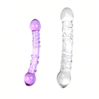 Clear and purple curved double-ended glass dildo comparison