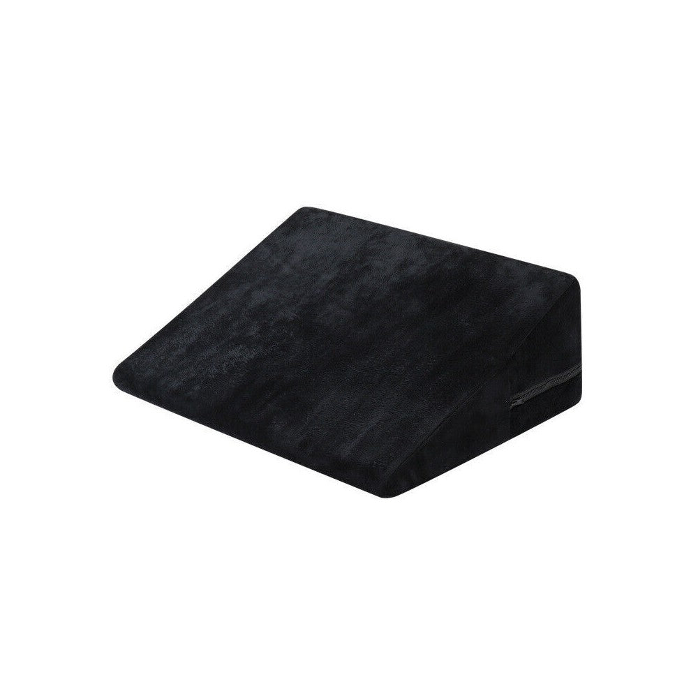 Black wedge-shaped support pillow with visible seam