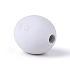 Light gray massager suction opening on original white background
