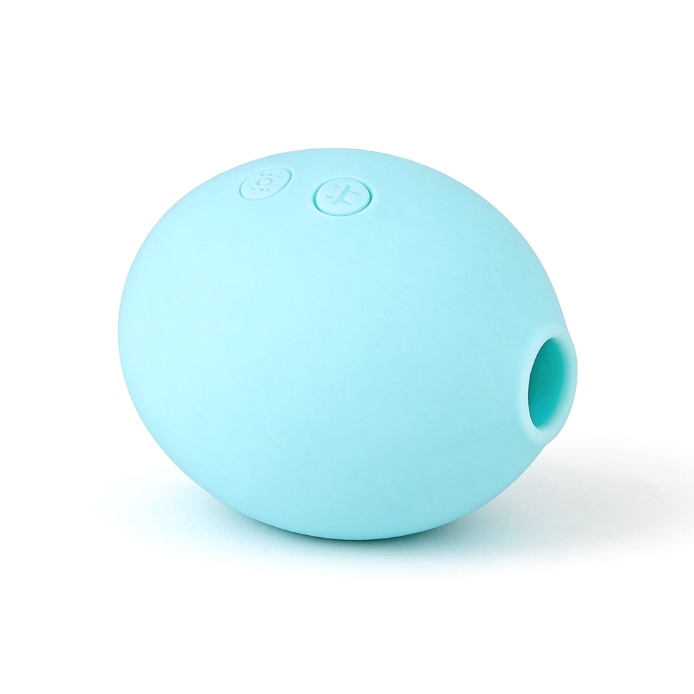 Mint green massager oval body detail on original white background