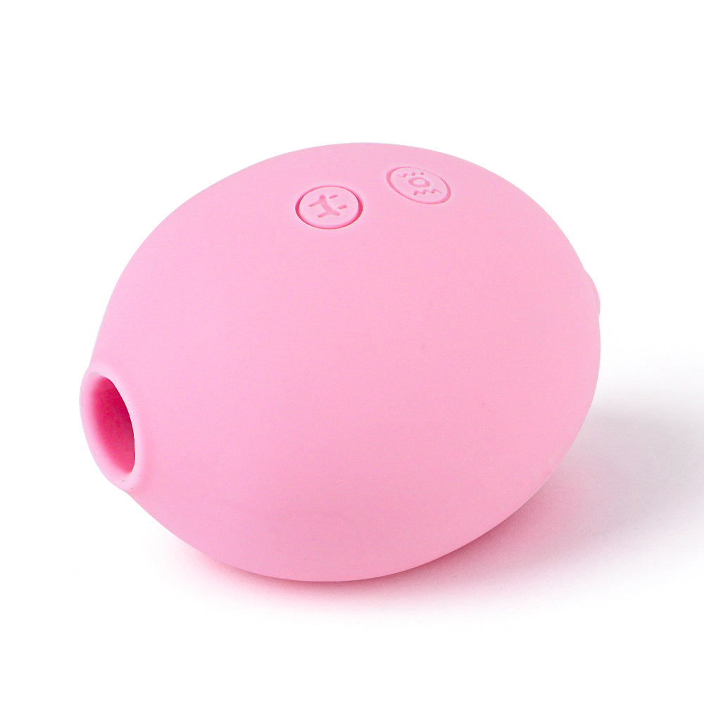 Pastel pink massager suction opening on original white background