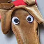 Plush reindeer face and decorative eyes detail