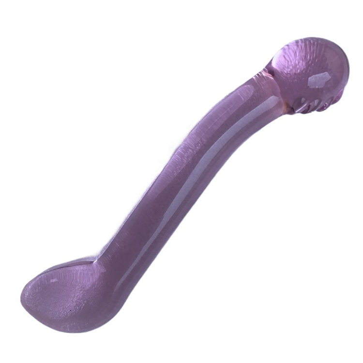 Curved double-ended purple glass dildo on white background